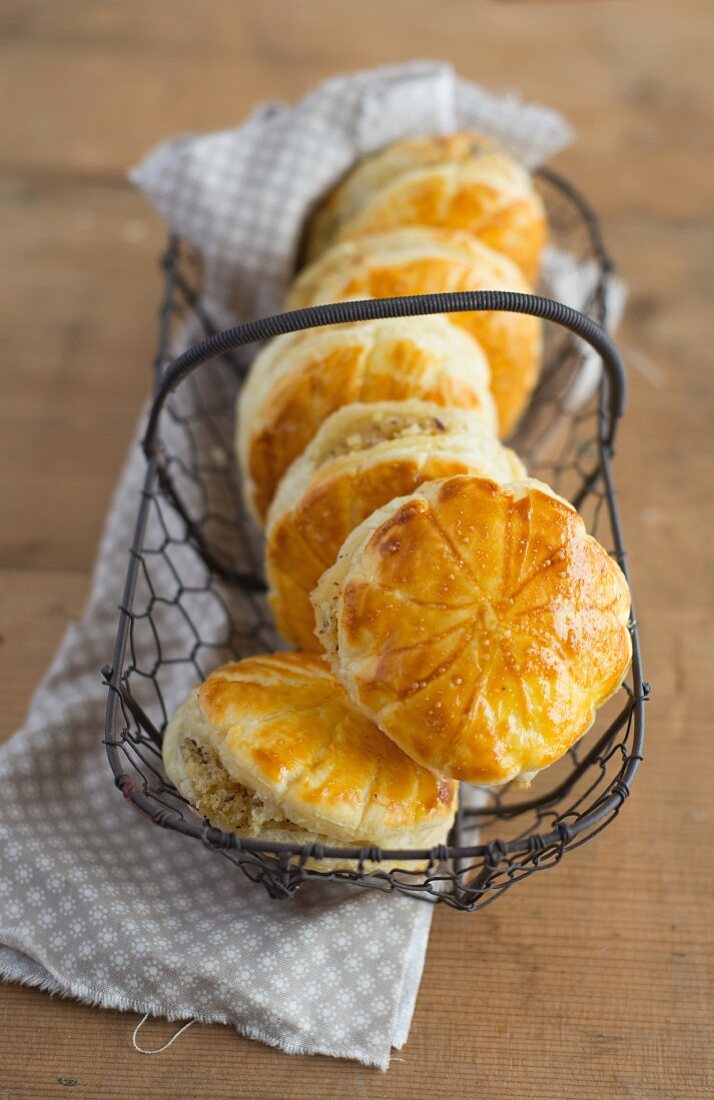 Mini galettes des rois in a wire basket