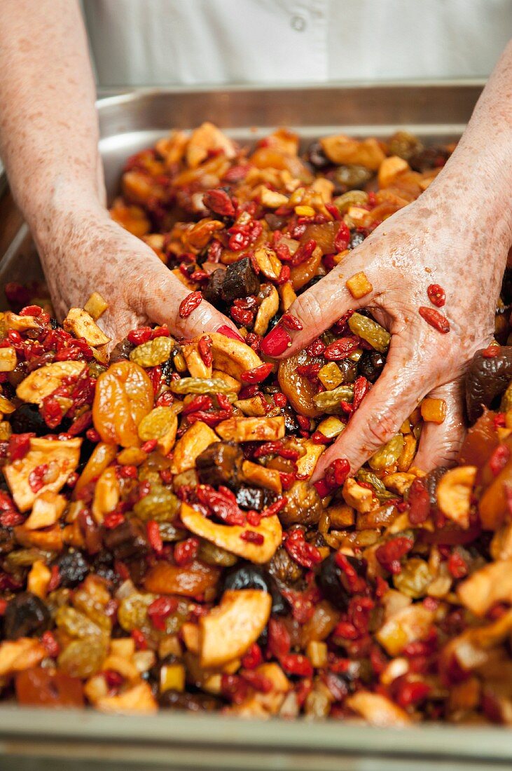 Dried fruits being mixed for spiced bread, Pain d'Épices de Mireille, Easter, Strasbourg