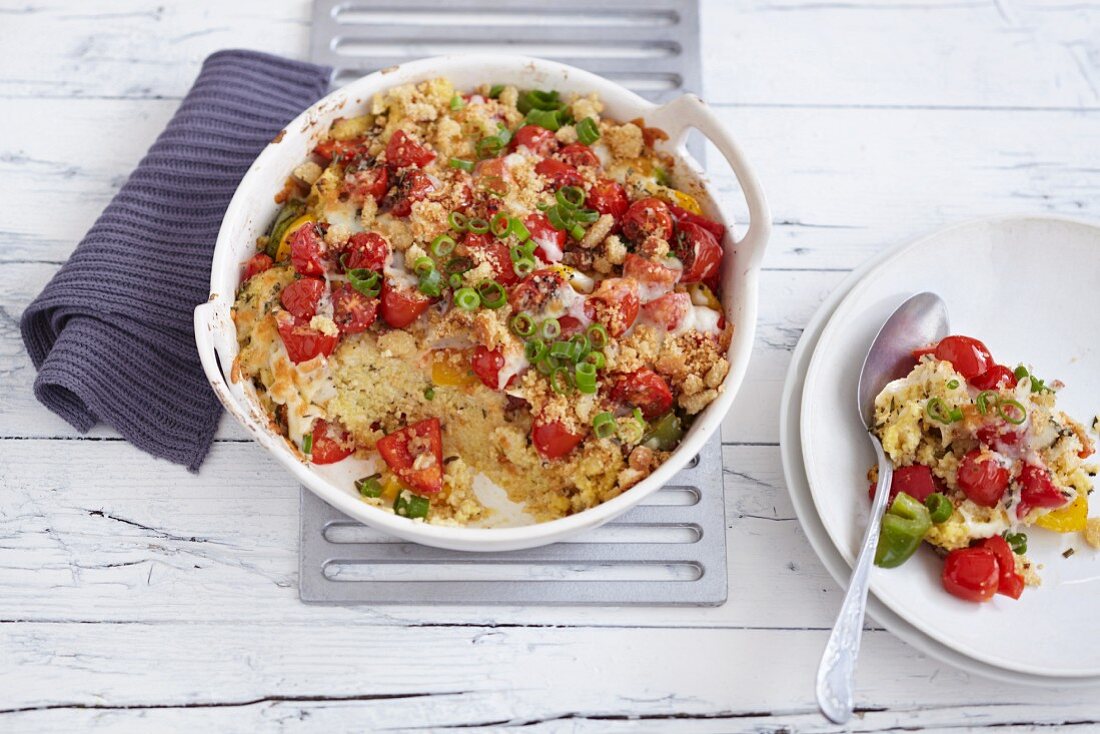 Millet bake with colourful peppers, spring onions and Pecorino cheese