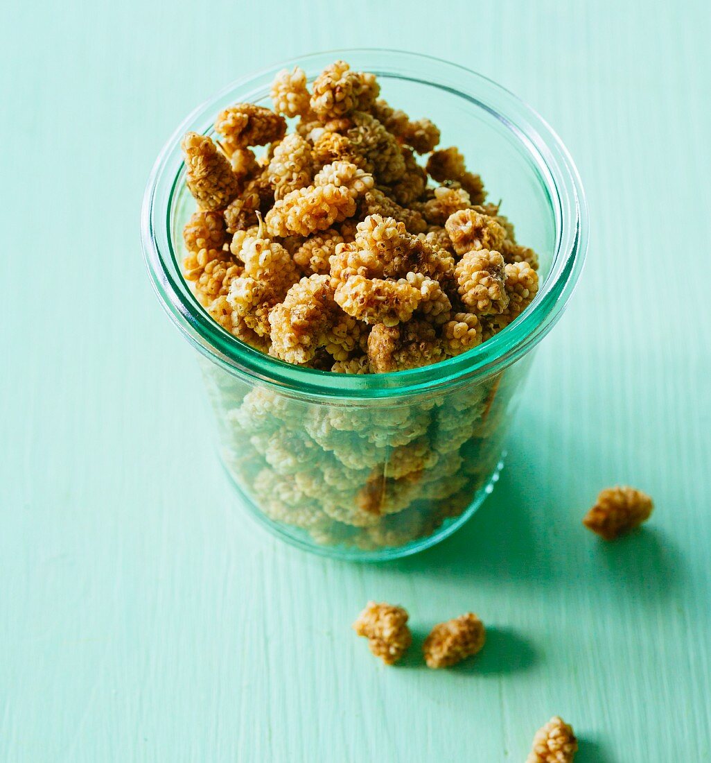 A jar of dried mulberries