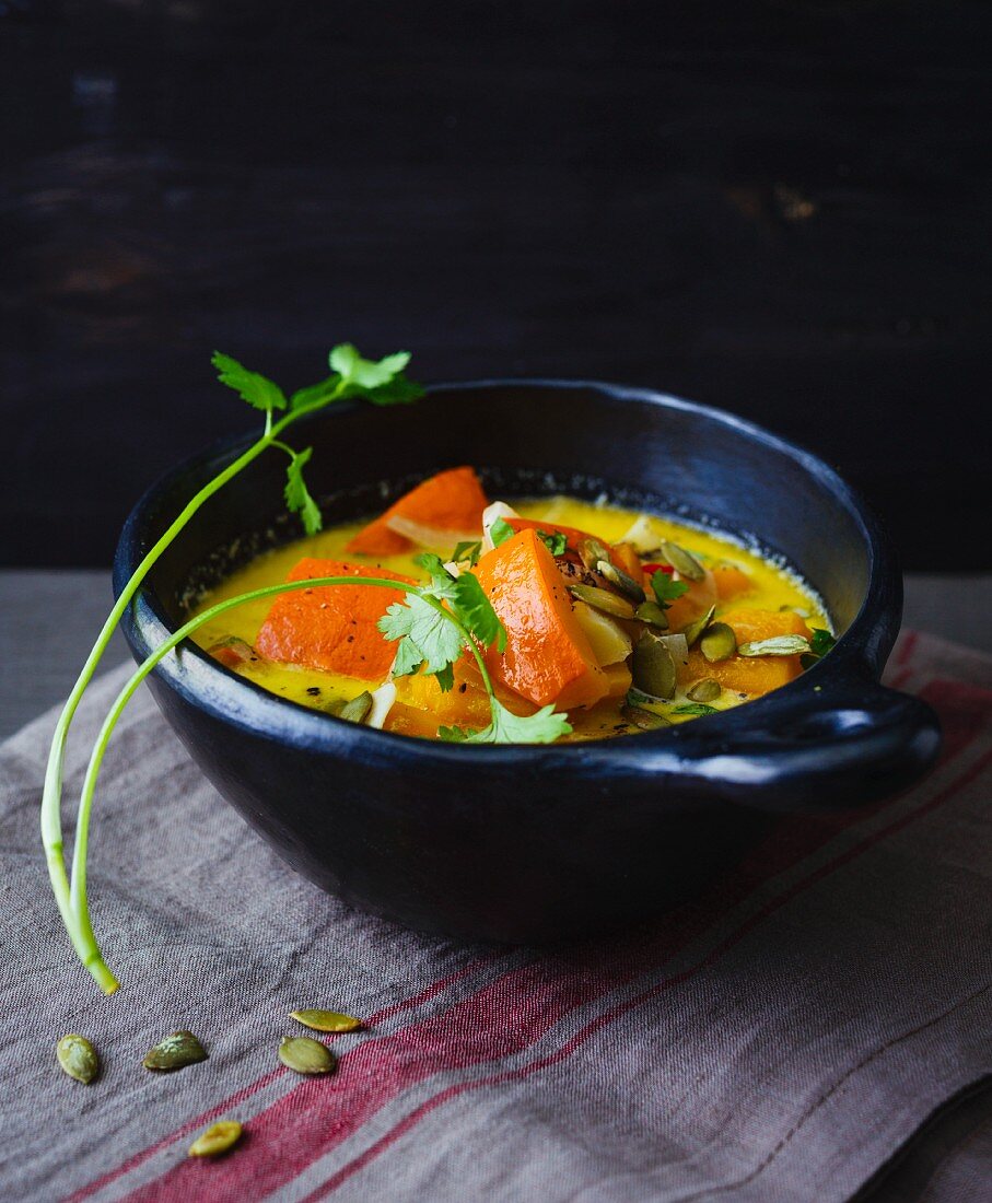 Thai pumpkin stew with ginger and coconut milk