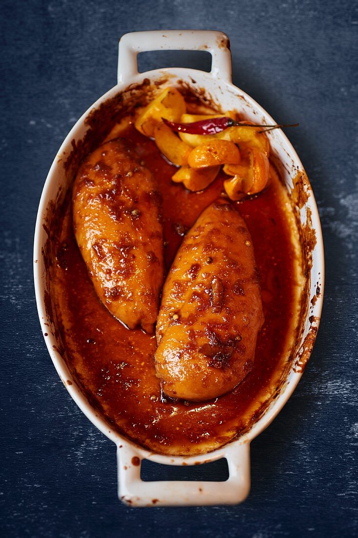 Oven-roasted chicken breast with chilli and apricots (seen from above)