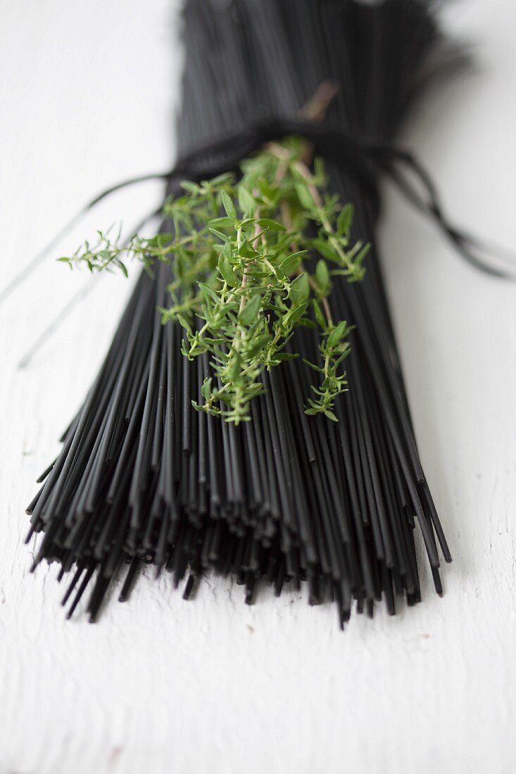 Black spaghetti coloured with coal (edible coal from Japan, for vegetarians)