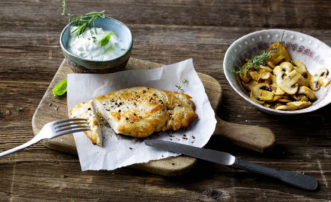 Roasted chicken fillets with roasted mushrooms and herb quark