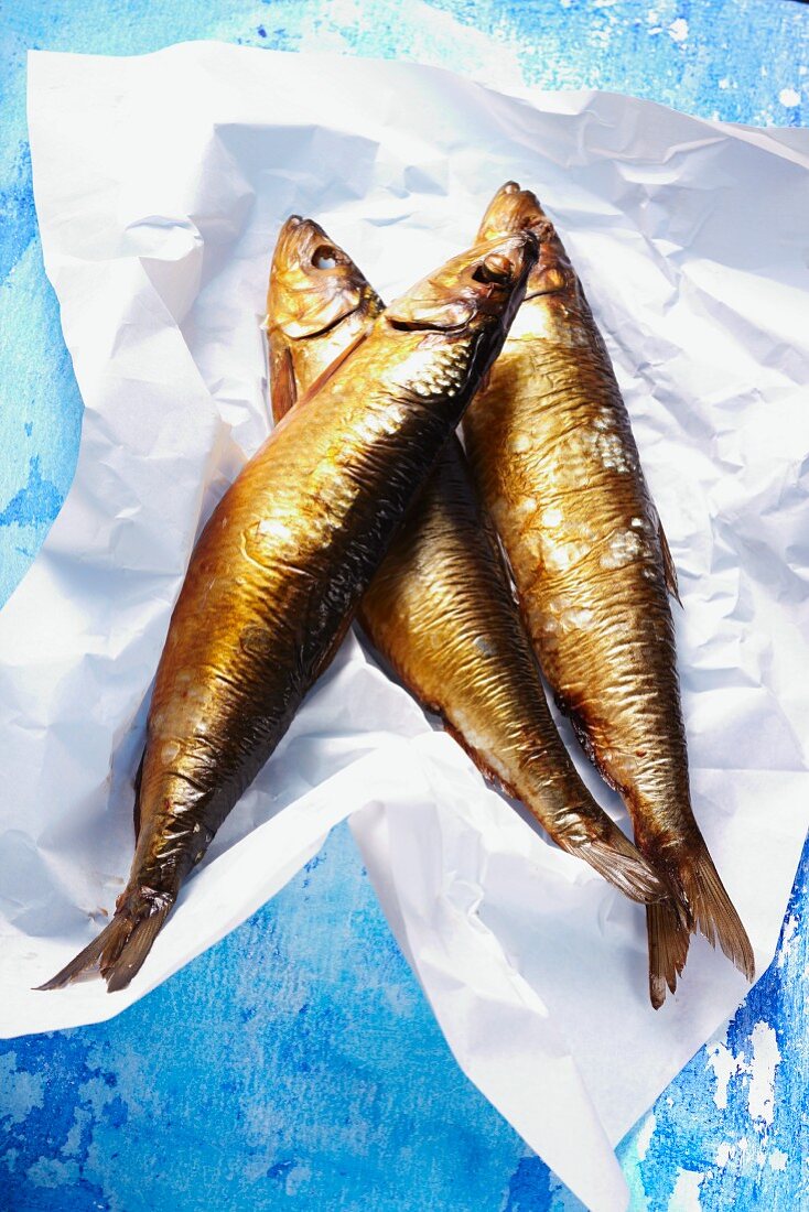 Smoked kippers on a piece of paper