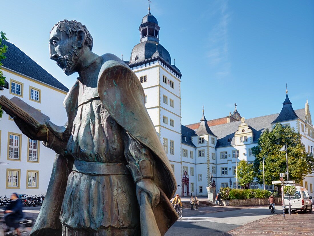 The sculpture of the human rights activist Friedrich von Spee in front of the Jesuit College