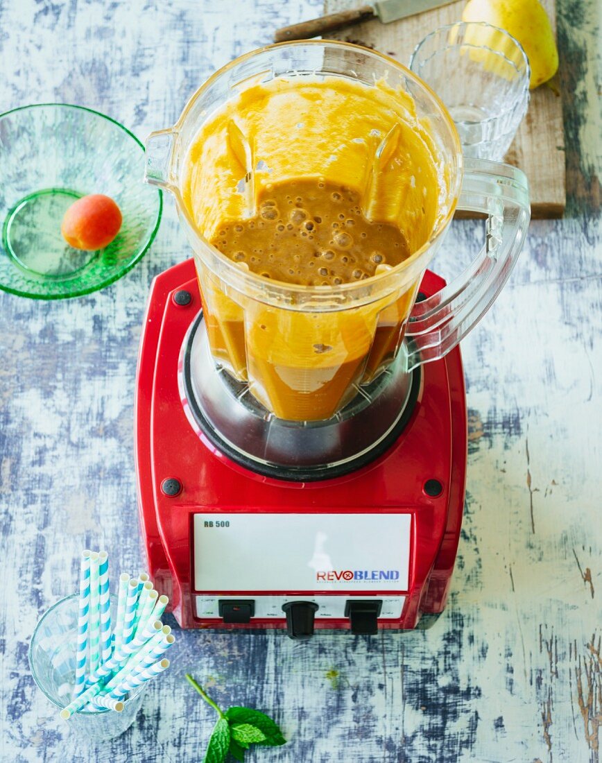 A fig and date smoothie with bananas, apricots, mint and acai powder