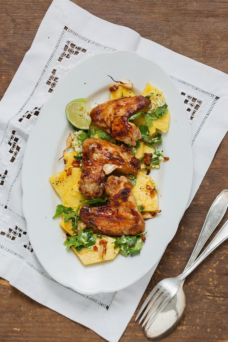 Chicken wings with pineapple and coriander