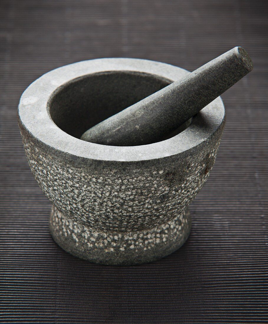 A stone mortar with a pestle