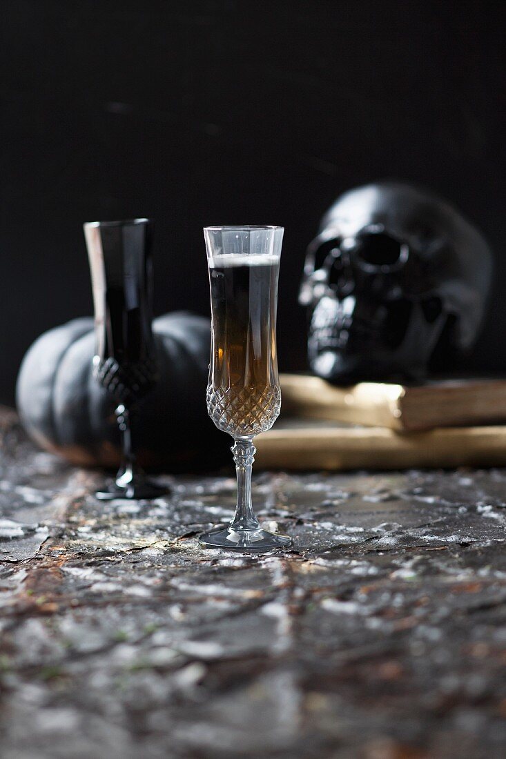 A Black Tooth cocktail made with Guinness, champagne and sambuca