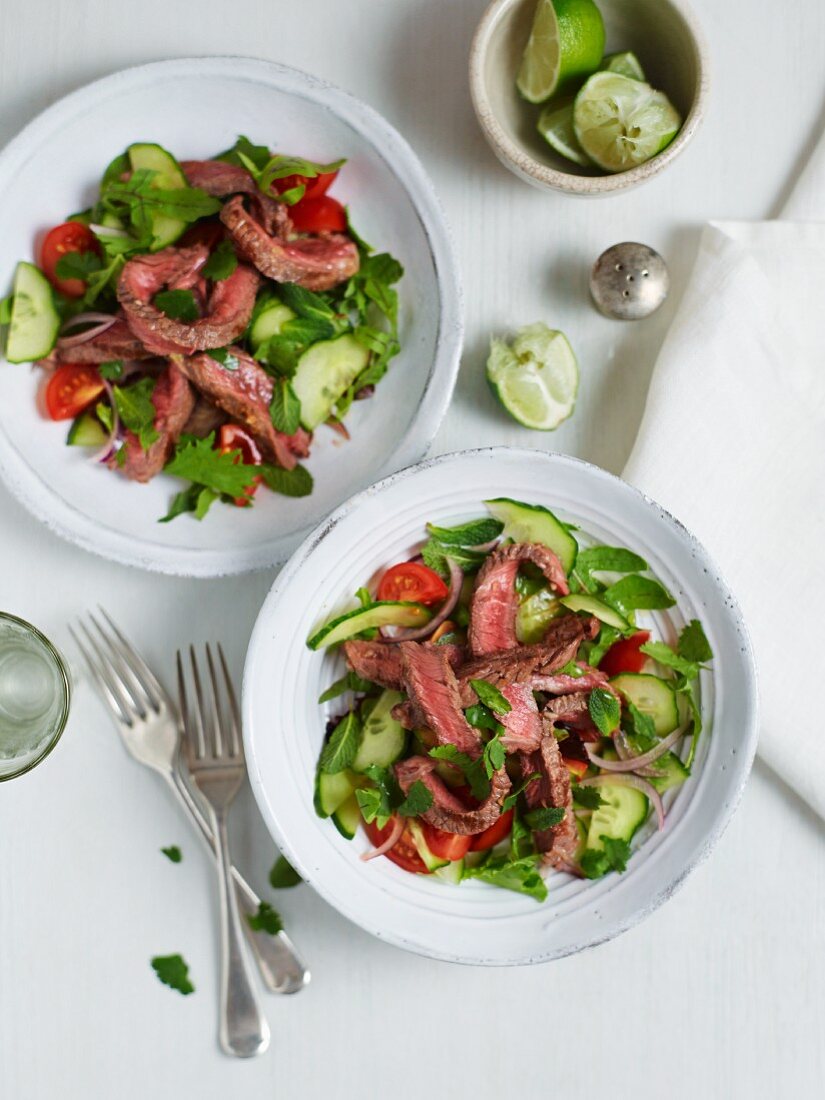 Thai beef salad; a colourful salad with fried, pink beef fillet strips