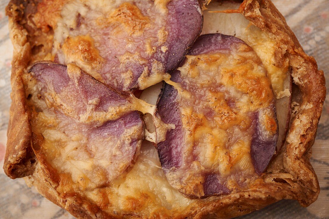 Savoury purple potato and cheese tart from Vermont, USA