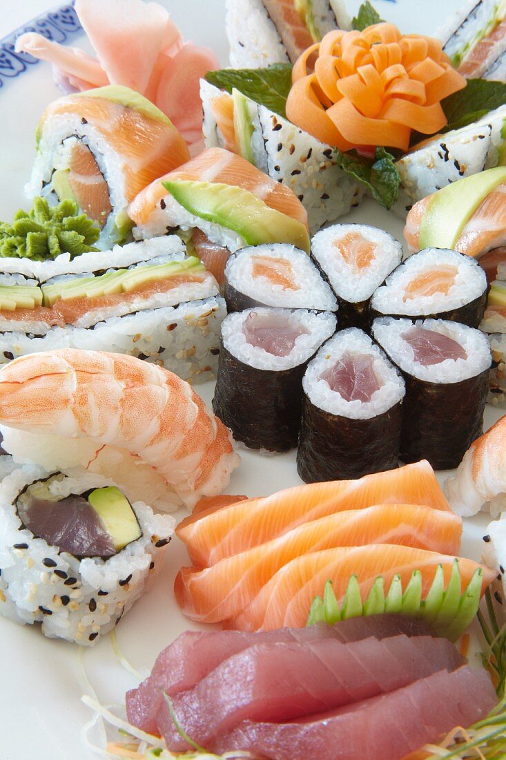 Various types of sushi on a platter