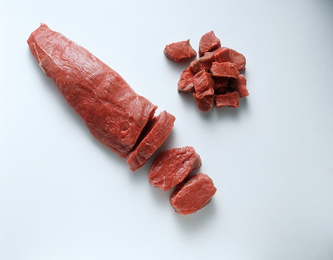 Beef fillet in the piece, slices and cubes