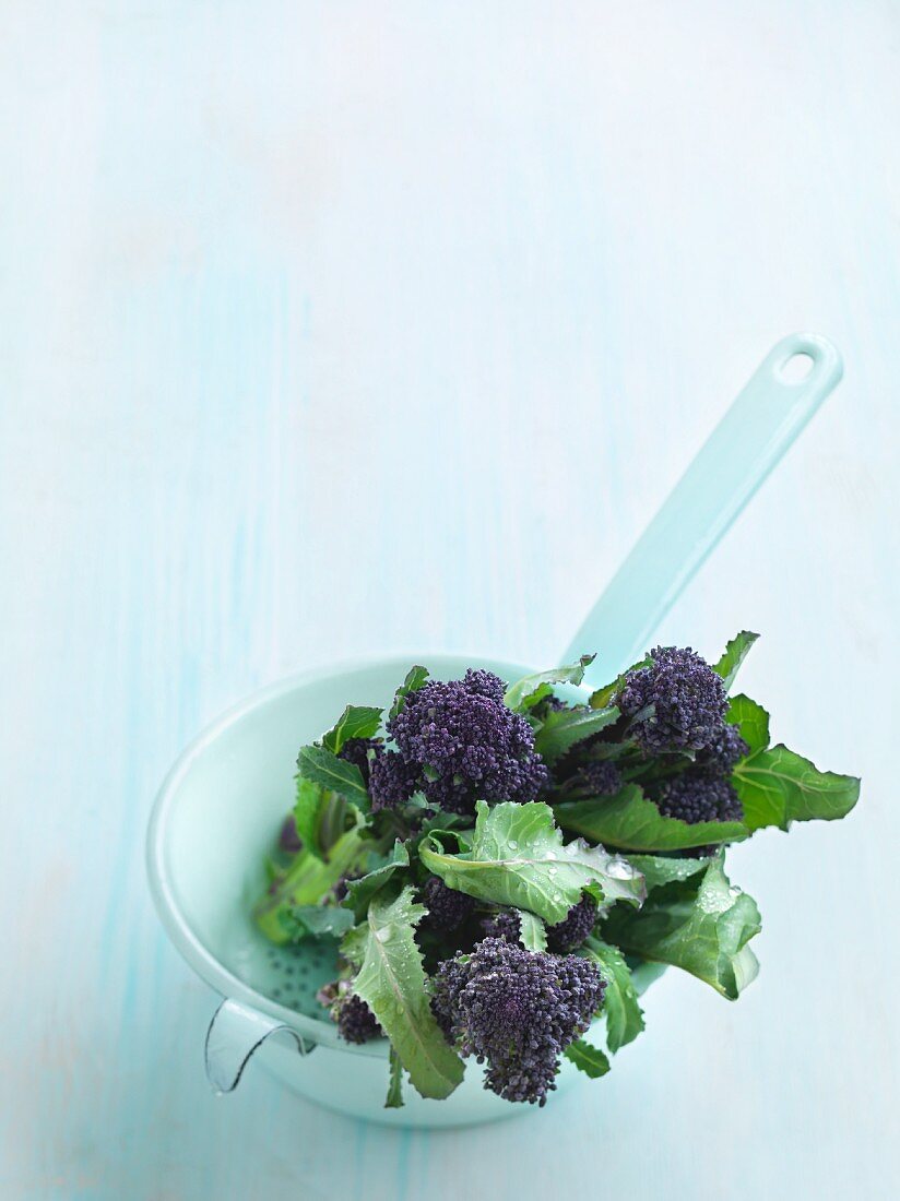 Fresh broccoli in a sieve