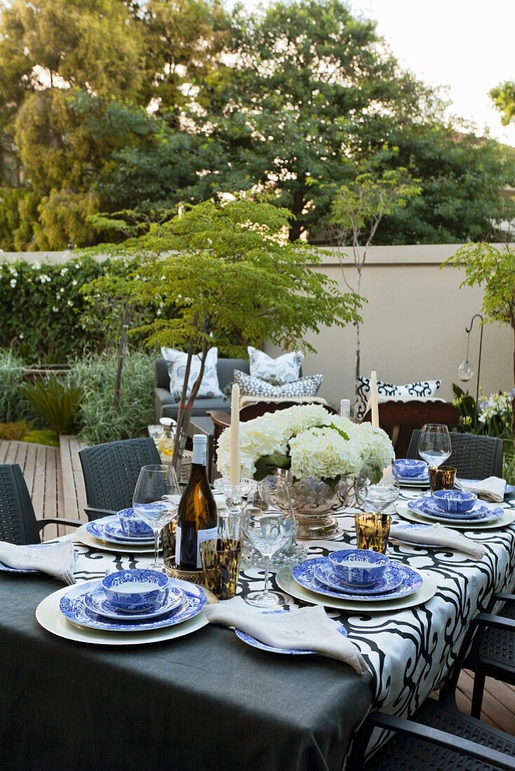 Festively set table on terrace