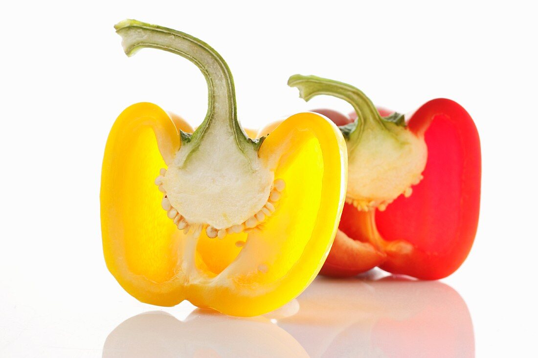 Two pepper halves (red and yellow)