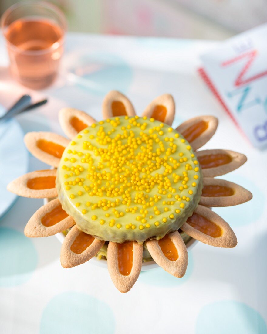 A sunflower cake with yellow sugar pearls