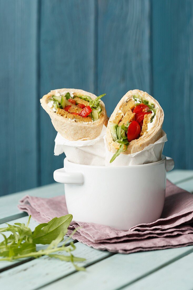 Cucumber wraps with lupine fillets, rocket and cherry tomatoes (vegan)