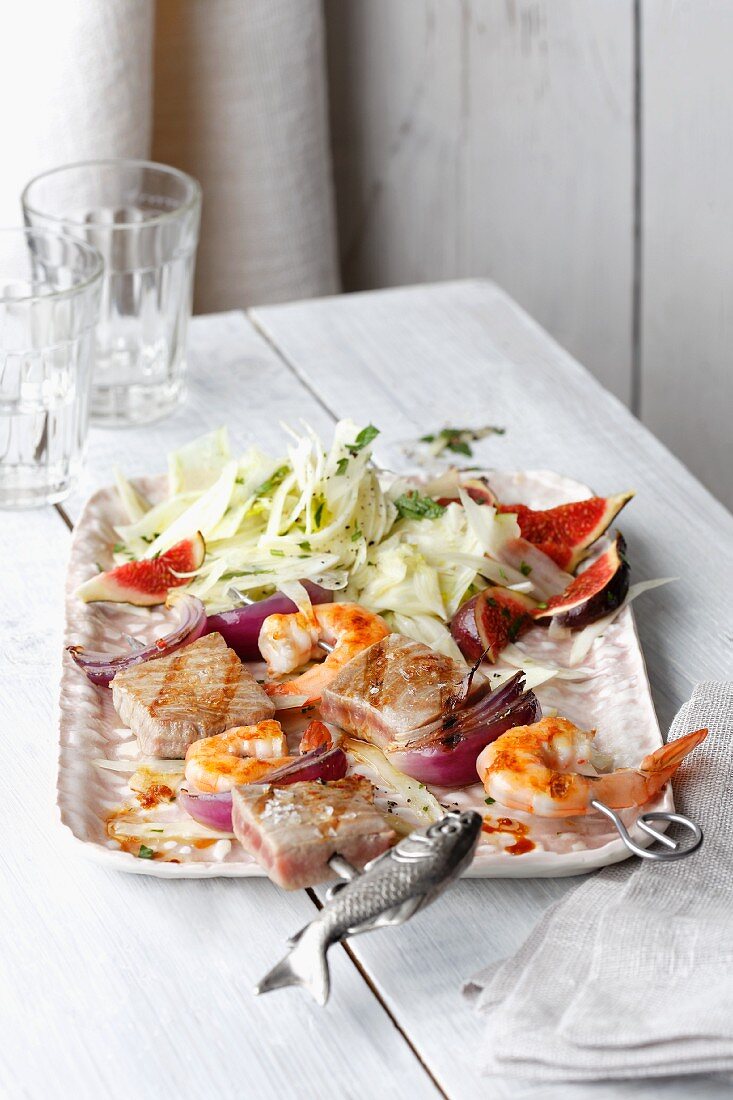 Tuna and prawn skewers with fennel salad and fresh figs