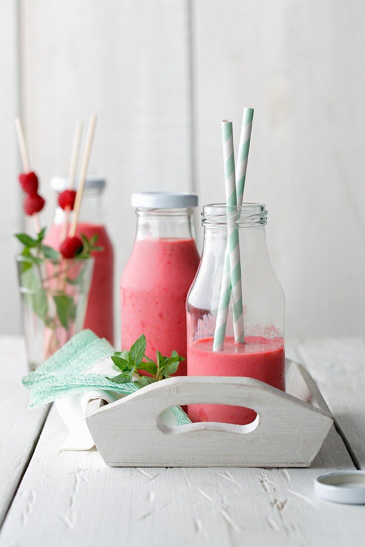 Smoothies made from raspberries, grapefruit, buttermilk and nutritional yeast