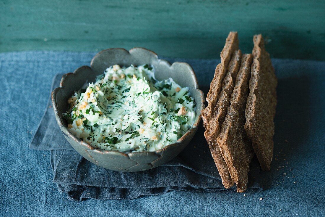 Yoghurt and herb spread with hard boiled eggs