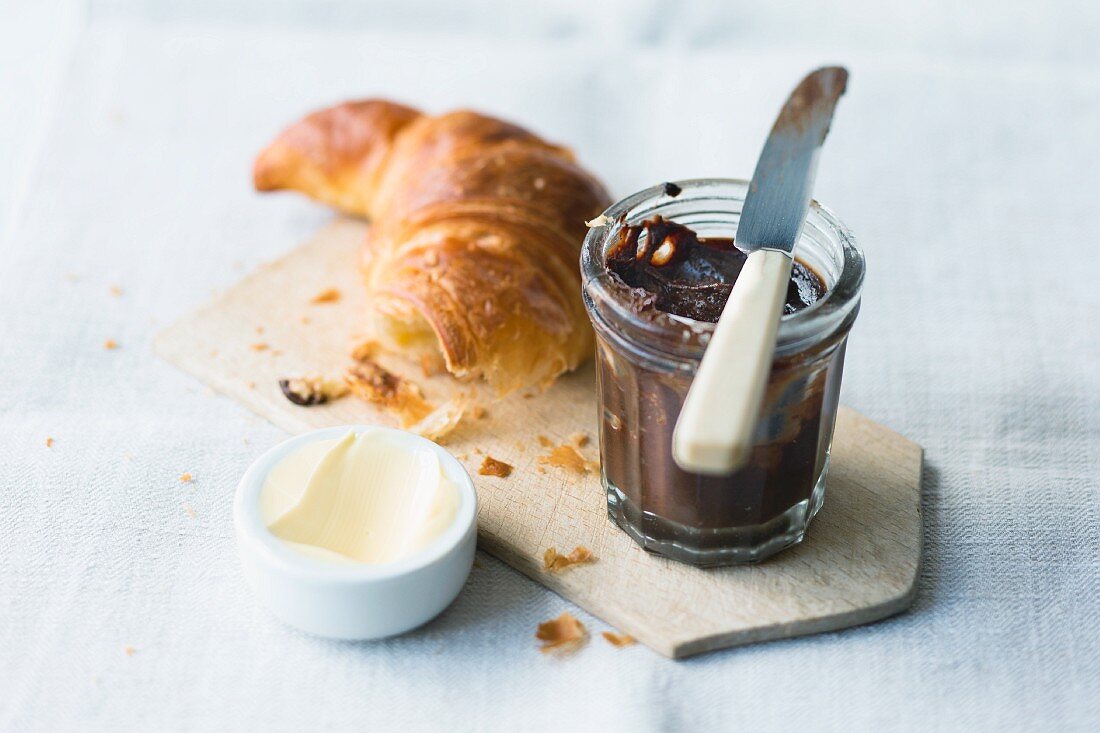 A croissant with an espresso and marzipan spread