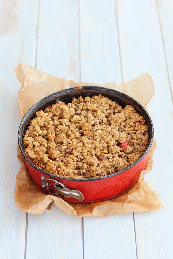 Flourless oat cake with apples and plums