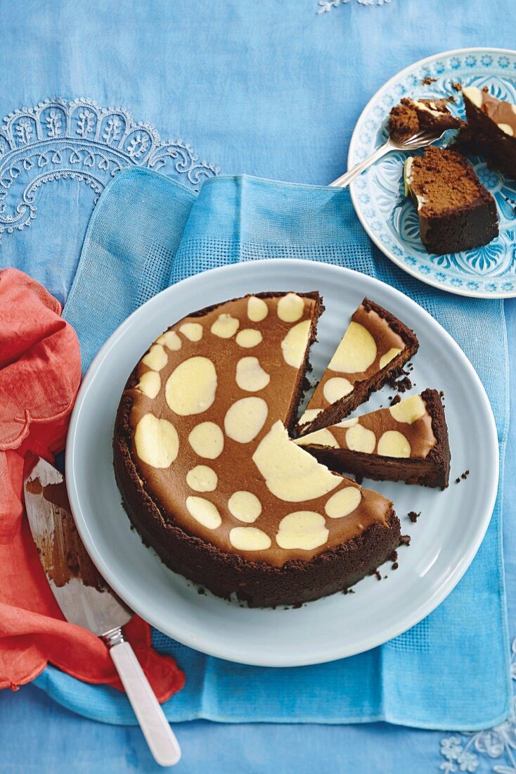 Dabbed chocolate-vanilla cheesecake, sliced