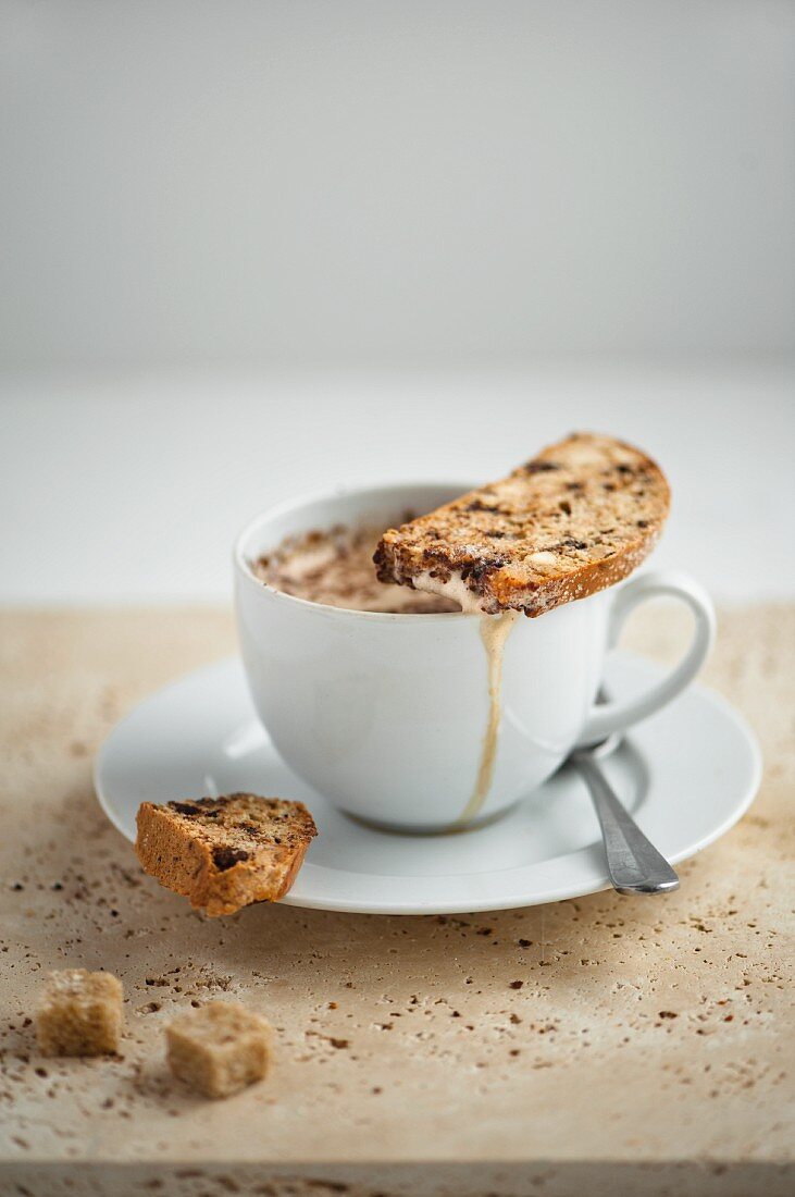 Biscotti on a coffee cup