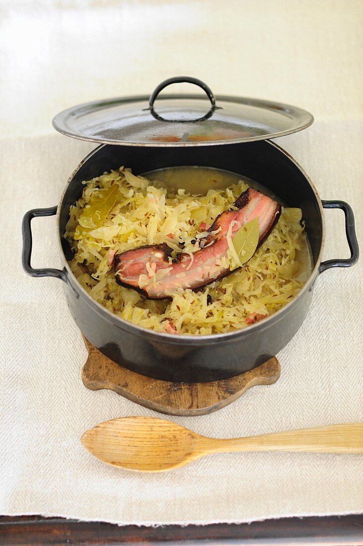 Sauerkraut with bacon in a pot