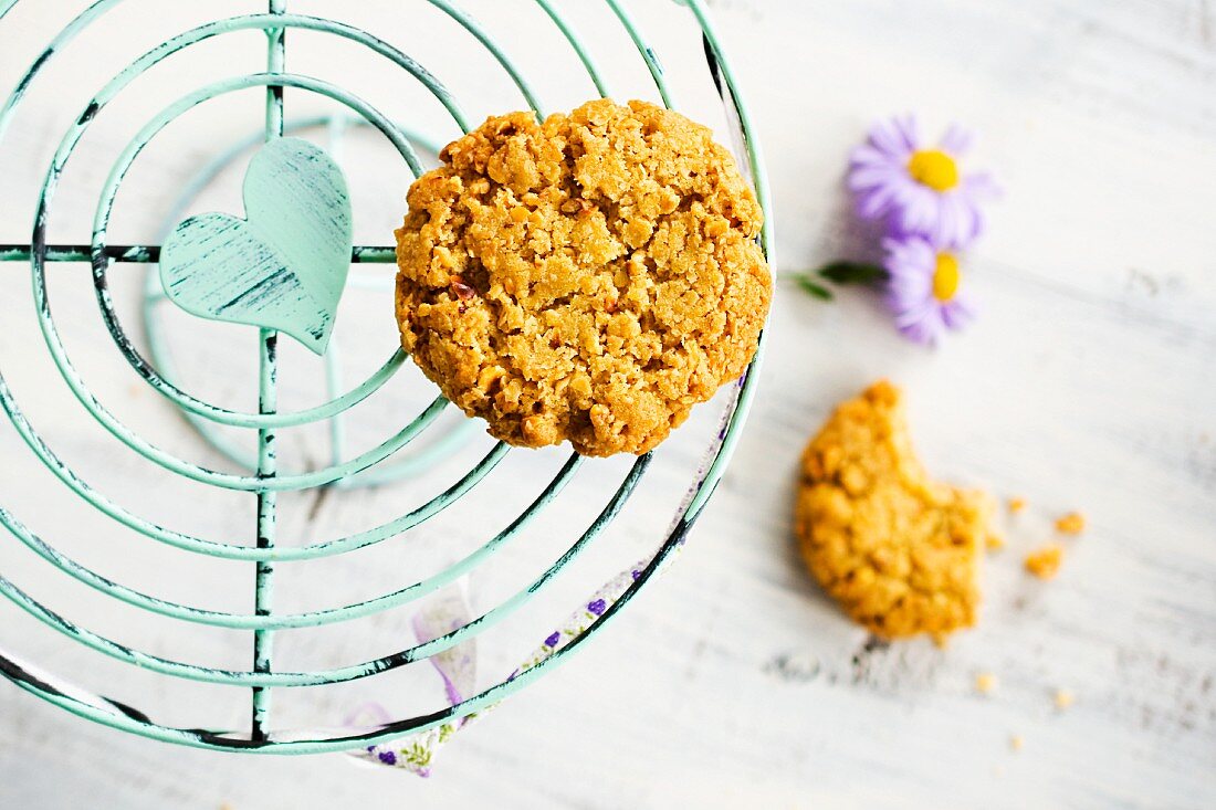 Nut biscuits on a cake stand with flowers