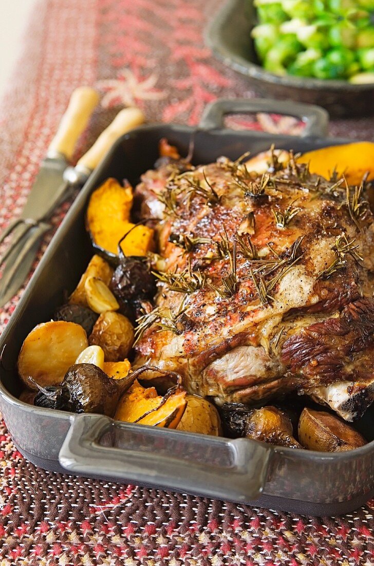 Roast lamb with rosemary and vegetables