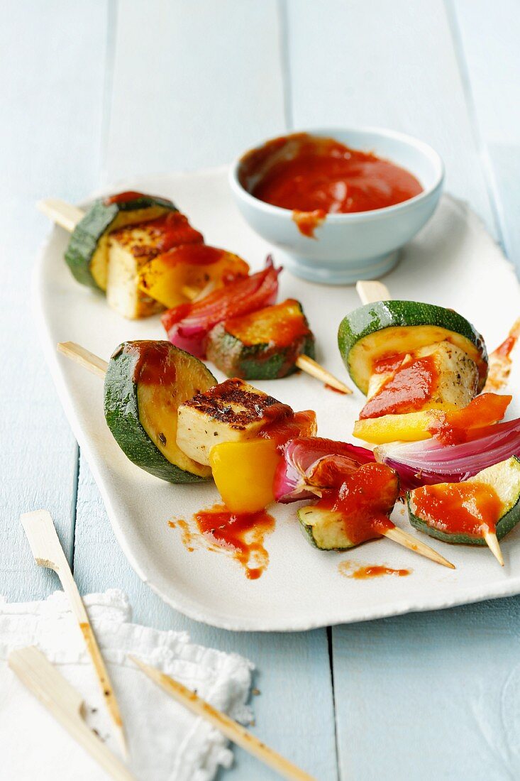 Vegetarian halloumi skewers with peppers and courgettes