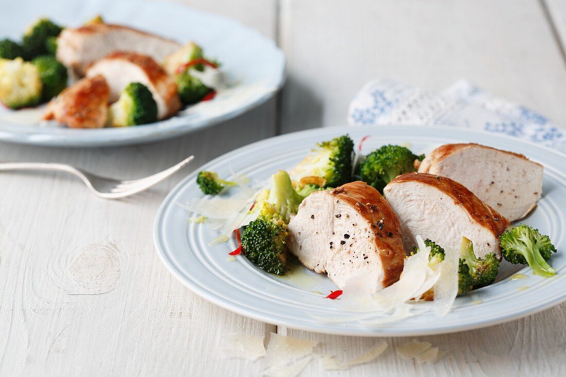 Fried chicken breast with broccoli and Parmesan