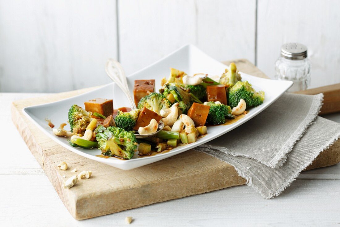 Vegan stir-fried broccoli with seitan and cashew nuts