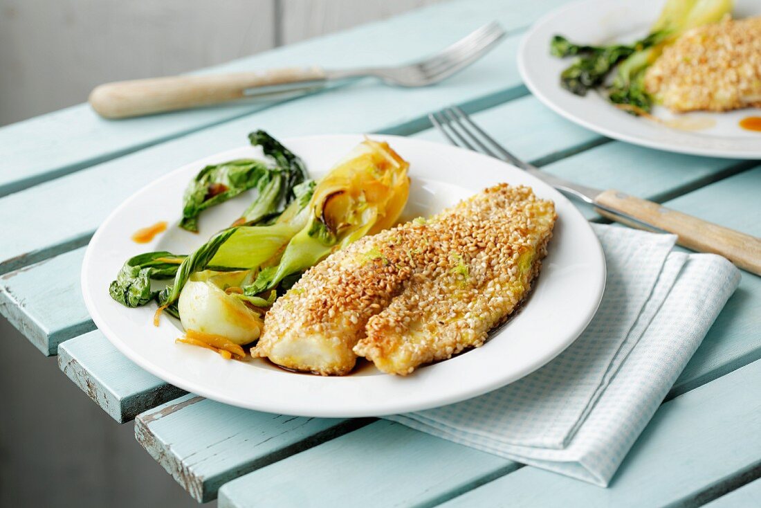 Sharks fillets in a sesame seed coating with bok choy