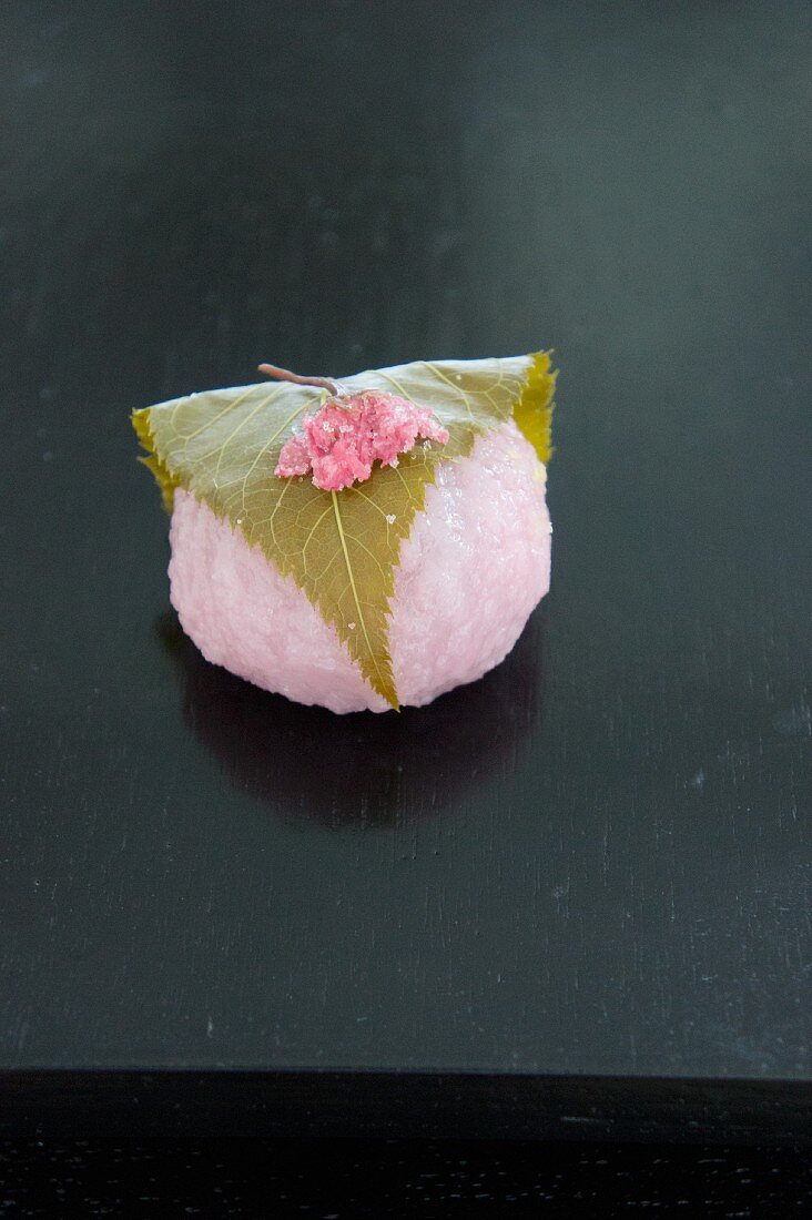 Sakura mochi with a cherry leaf (traditional sweet for the cherry blossom festival, Japan)