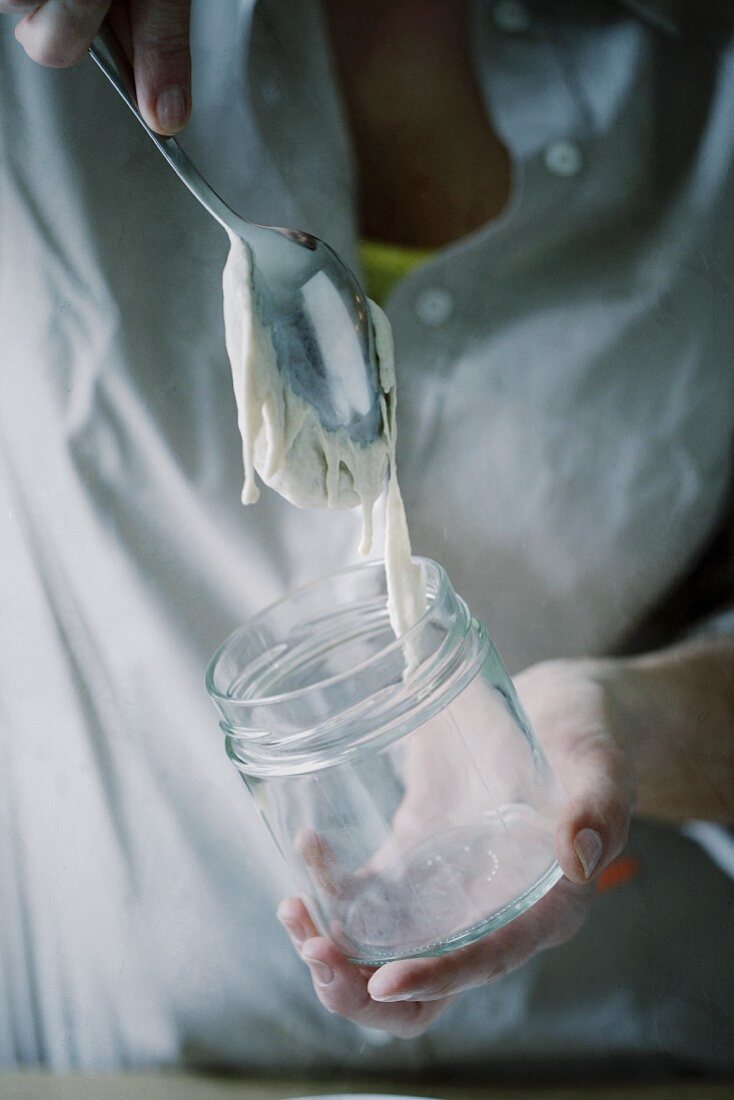 Sourdough being poured into a glass