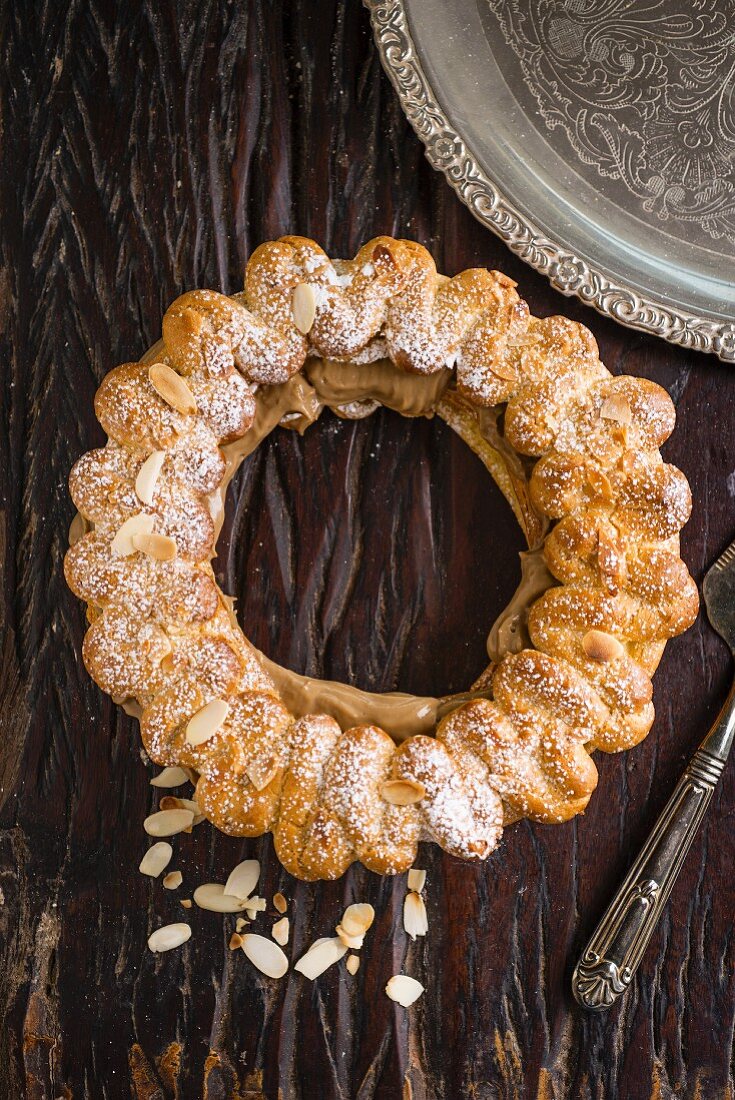 Paris brest with coffee cream and flaked almonds