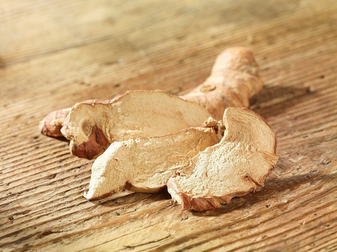 Galangal on a wooden surface