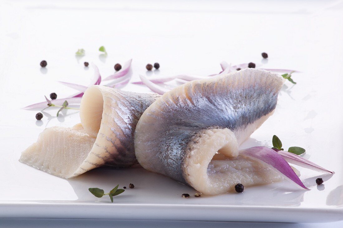 Herring fillets with red onions