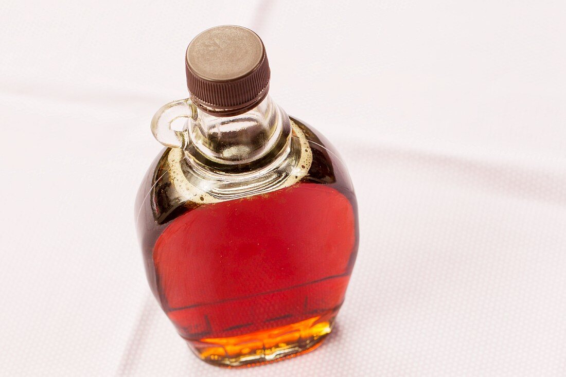 A bottle of maple syrup