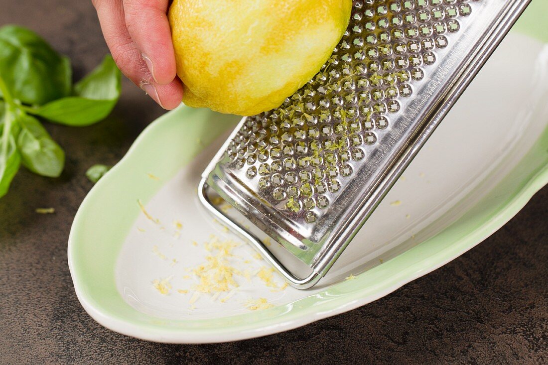 A lemon being grated
