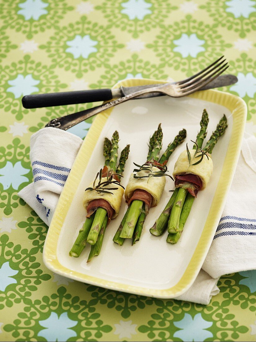 Asparagus wrapped in ham