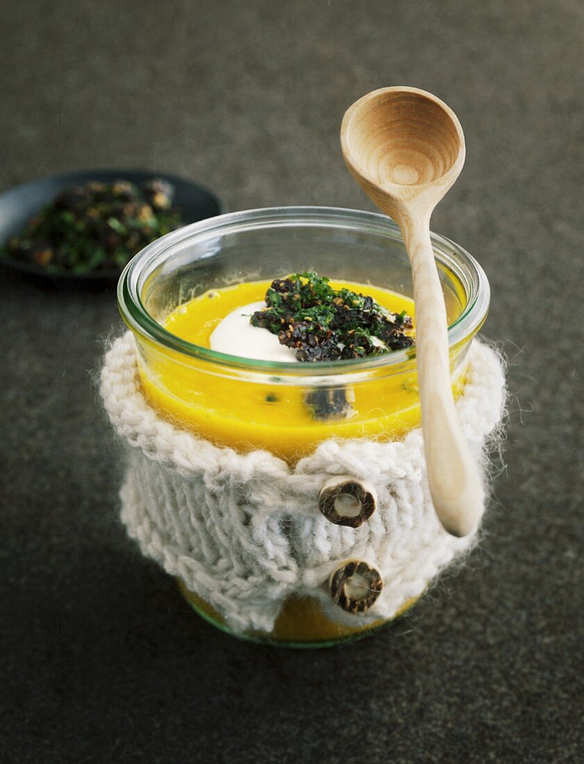 Cream of carrot soup with ginger and parsley crumbs