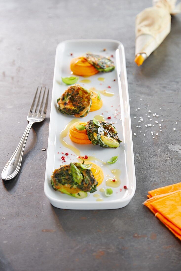 Asparagus and spinach fritters with carrot cream