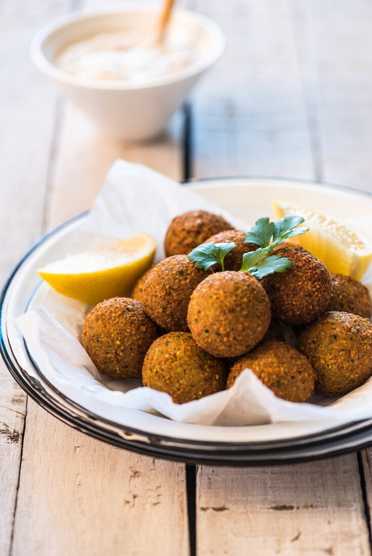 Falafel with lemon wedges