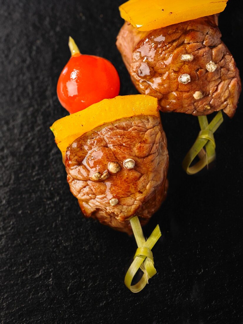 Beef and pepper skewers with cherry tomatoes