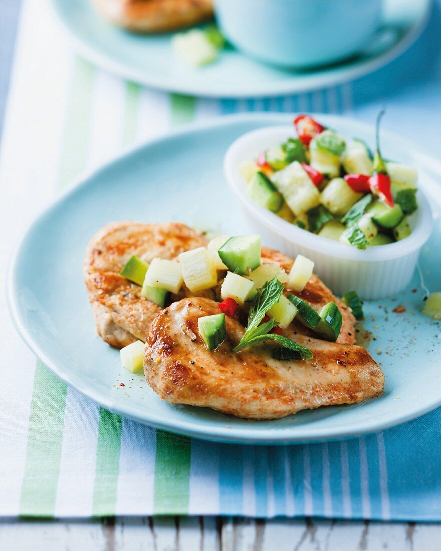 Fried chicken breast with a pineapple salsa